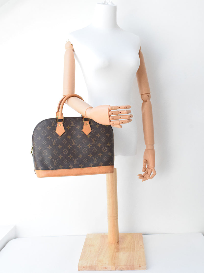 Louis Vuitton Alma Monogram Coated Canvas PM