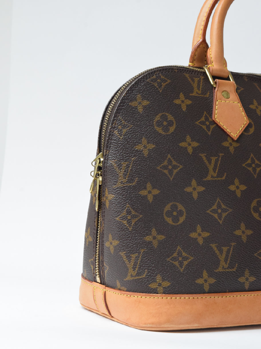 Louis Vuitton Alma Monogram Coated Canvas PM